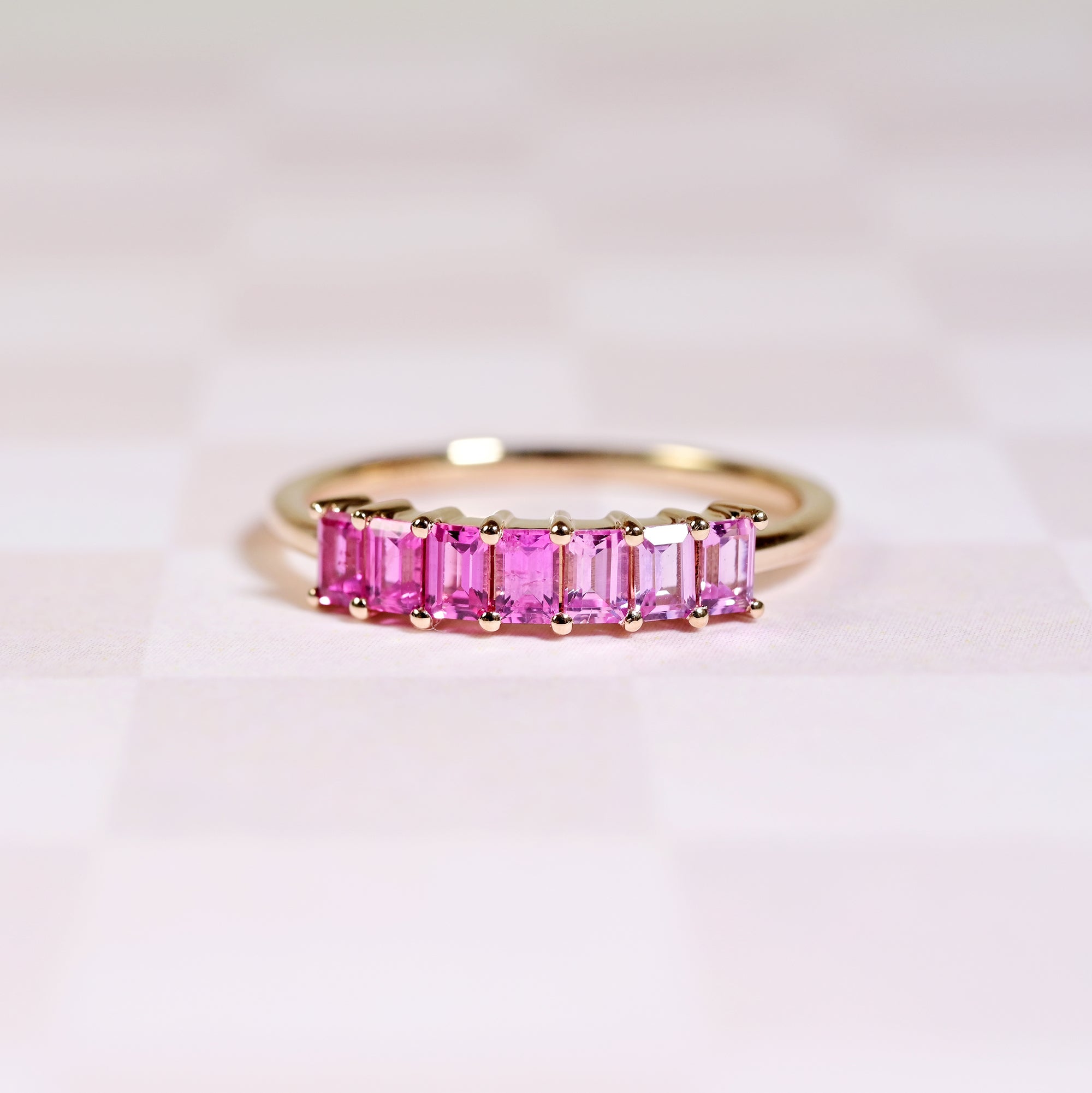 Cute pink sapphire ring with gradient ombre colors
