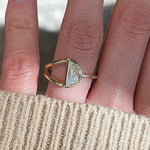 Half moon diamond in a split shank 14k yellow gold engagement ring setting