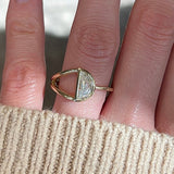 Half moon diamond in a split shank 14k yellow gold engagement ring setting