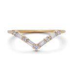 V-shaped 14k yellow gold wedding band with 4 baguette diamonds and 5 round diamonds