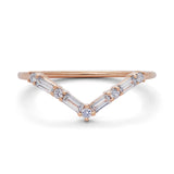 V-shaped rose gold wedding band with 4 baguette diamonds and 5 round diamonds