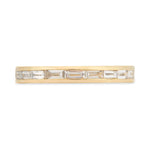 Channel set baguette diamond wedding band in 14k yellow gold