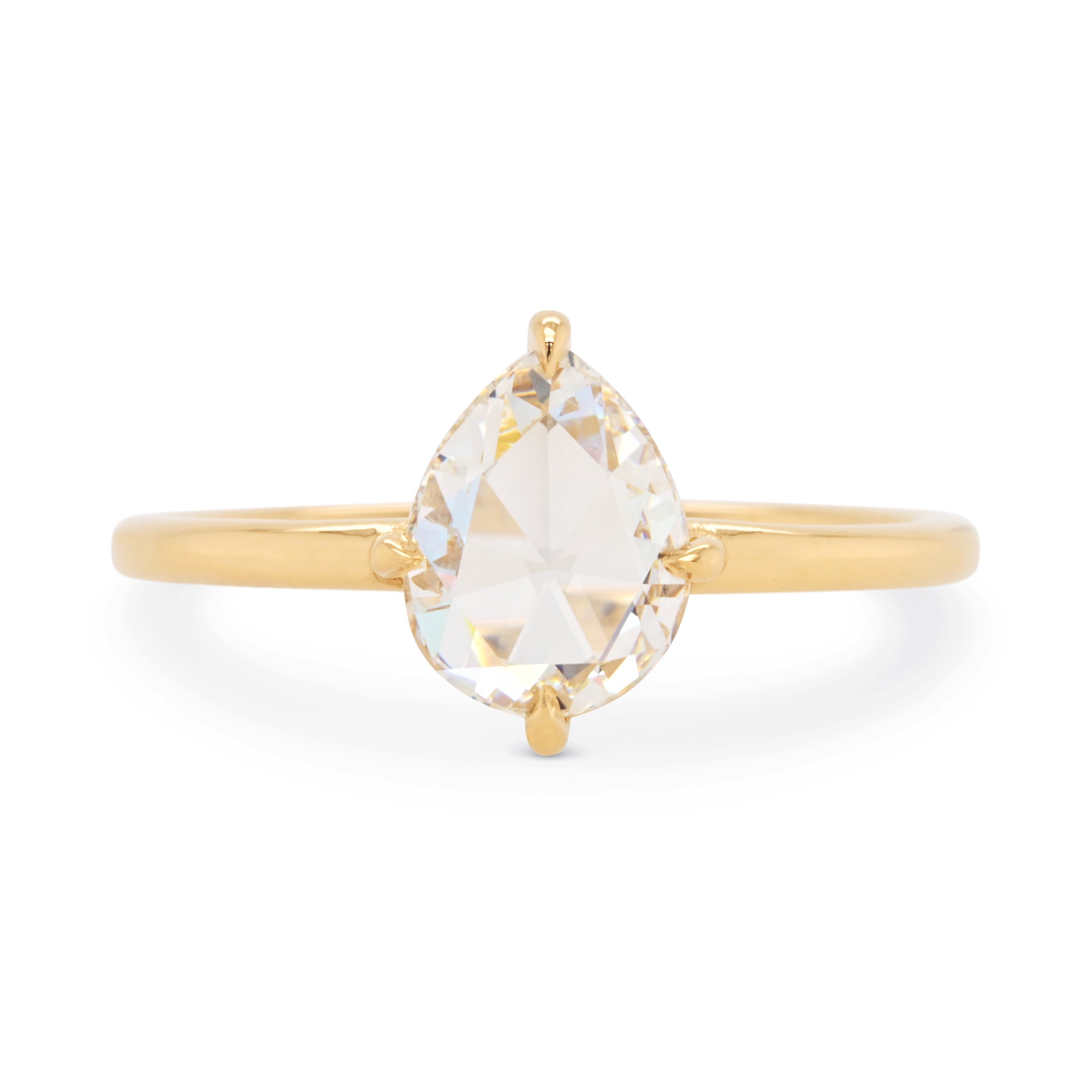 Rose cut pear diamond in a 14k yellow gold solitaire engagement ring setting