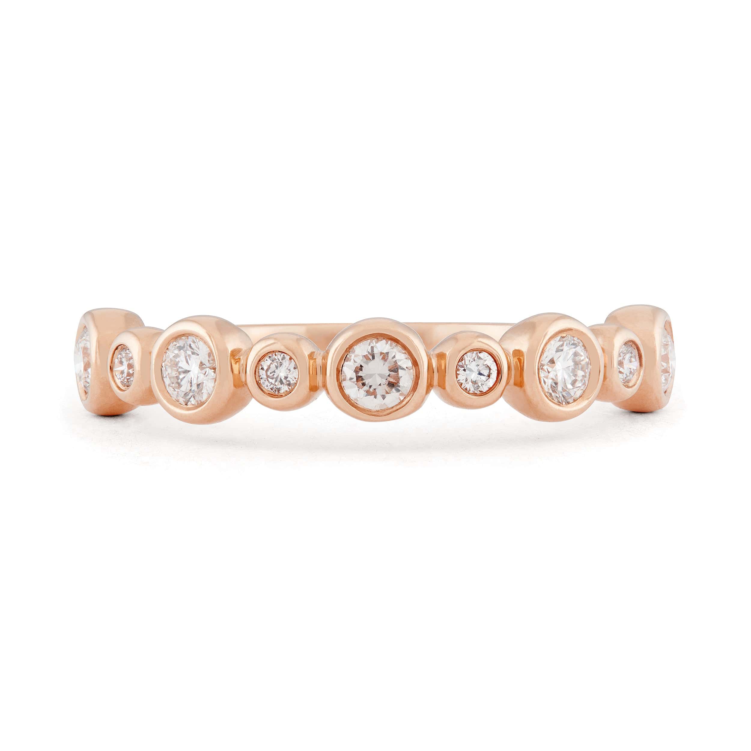Diamond and 14k rose gold bezel set wedding band