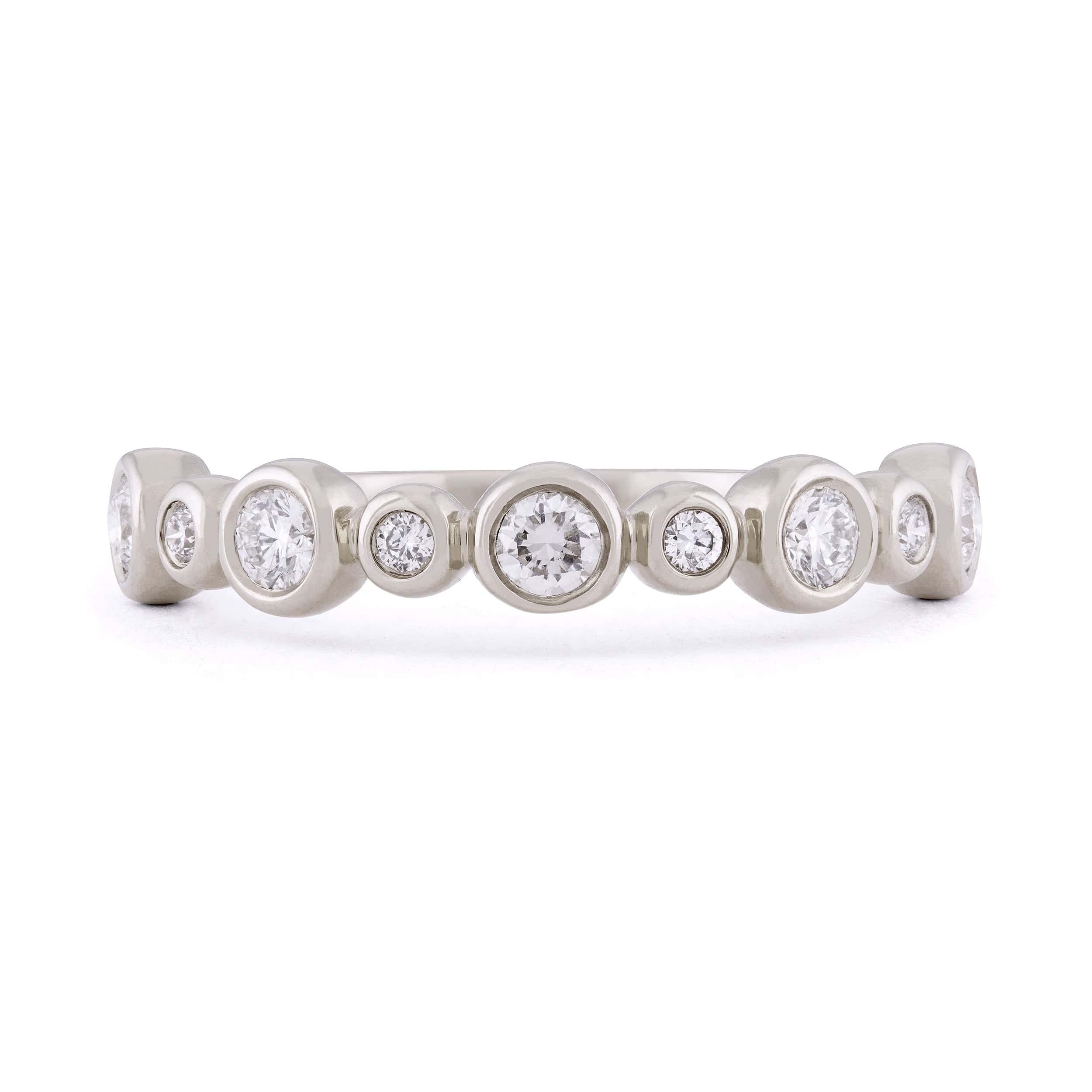 Diamond and 14k white gold bezel set wedding band