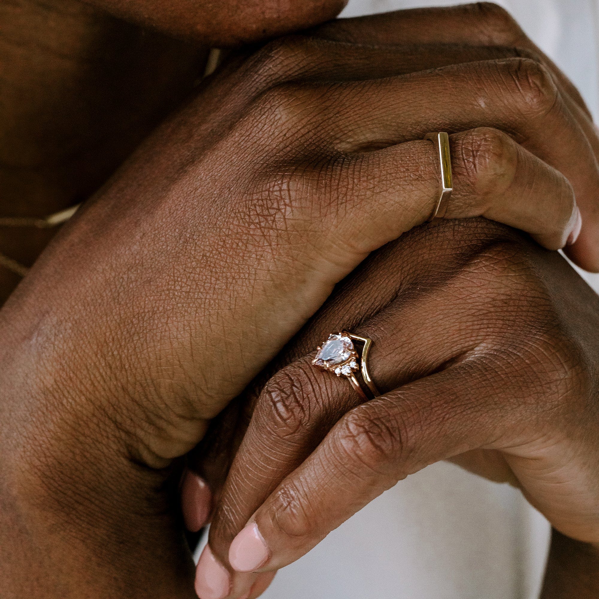 pear ring with chevron gold band in 14K Yellow gold
