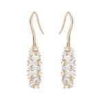 baguette earrings alternating as they dangle from north to south