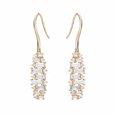 baguette earrings alternating as they dangle from north to south