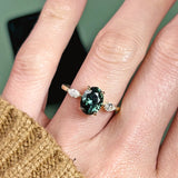 Teal oval sapphire engagement ring