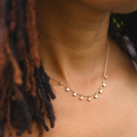 diamond chain necklace with bezel set stone