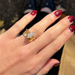 14k yellow gold marquise diamond engagement ring with a thick gold wedding band