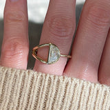 Half moon diamond in a split shank 14k yellow gold engagement ring setting