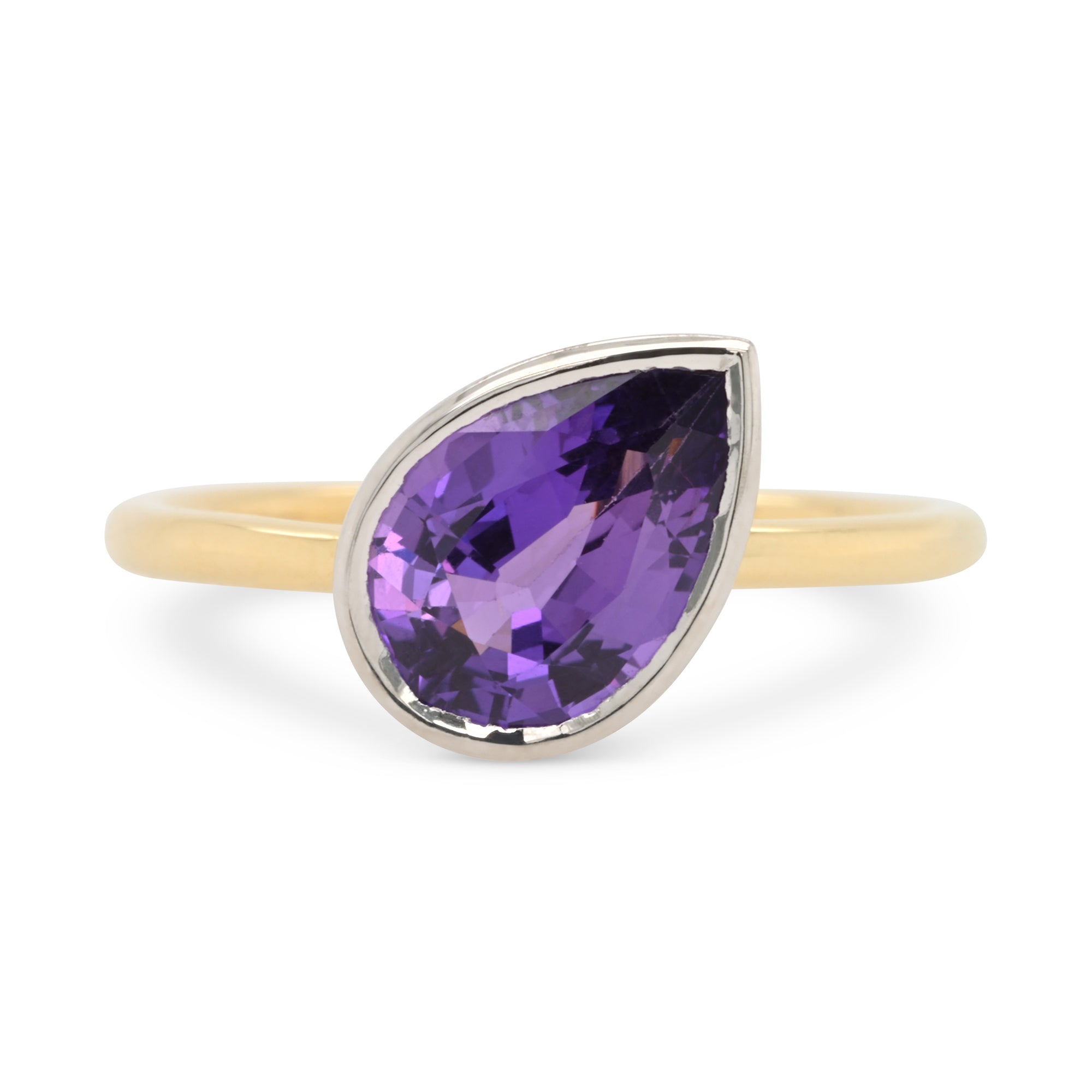 Purple pear sapphire bezel set engagement ring