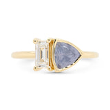 Toi-et-moi baguette diamond and light blue Montana sapphire engagement ring set in 14k yellow gold