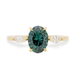 Teal sapphire engagement ring