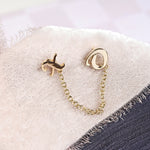 solid gold XO earrings