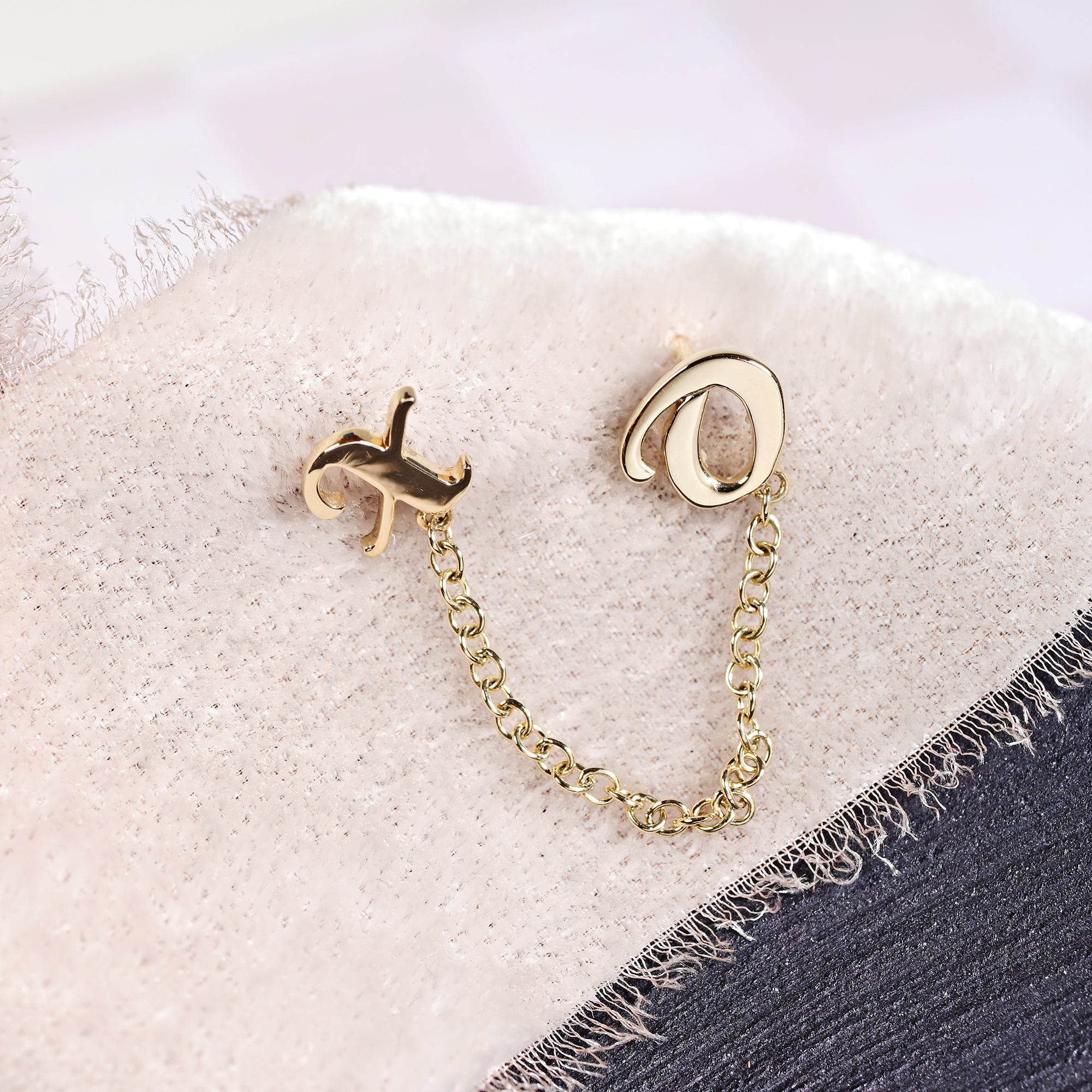 solid gold XO earrings