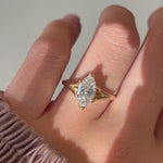 Video of a 14k yellow gold marquise diamond engagement ring