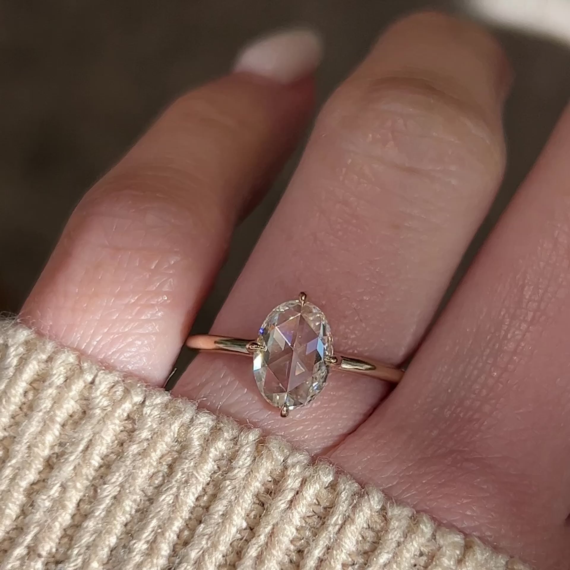 Video of a Rose cut oval diamond in a 14k yellow gold solitaire engagement ring setting