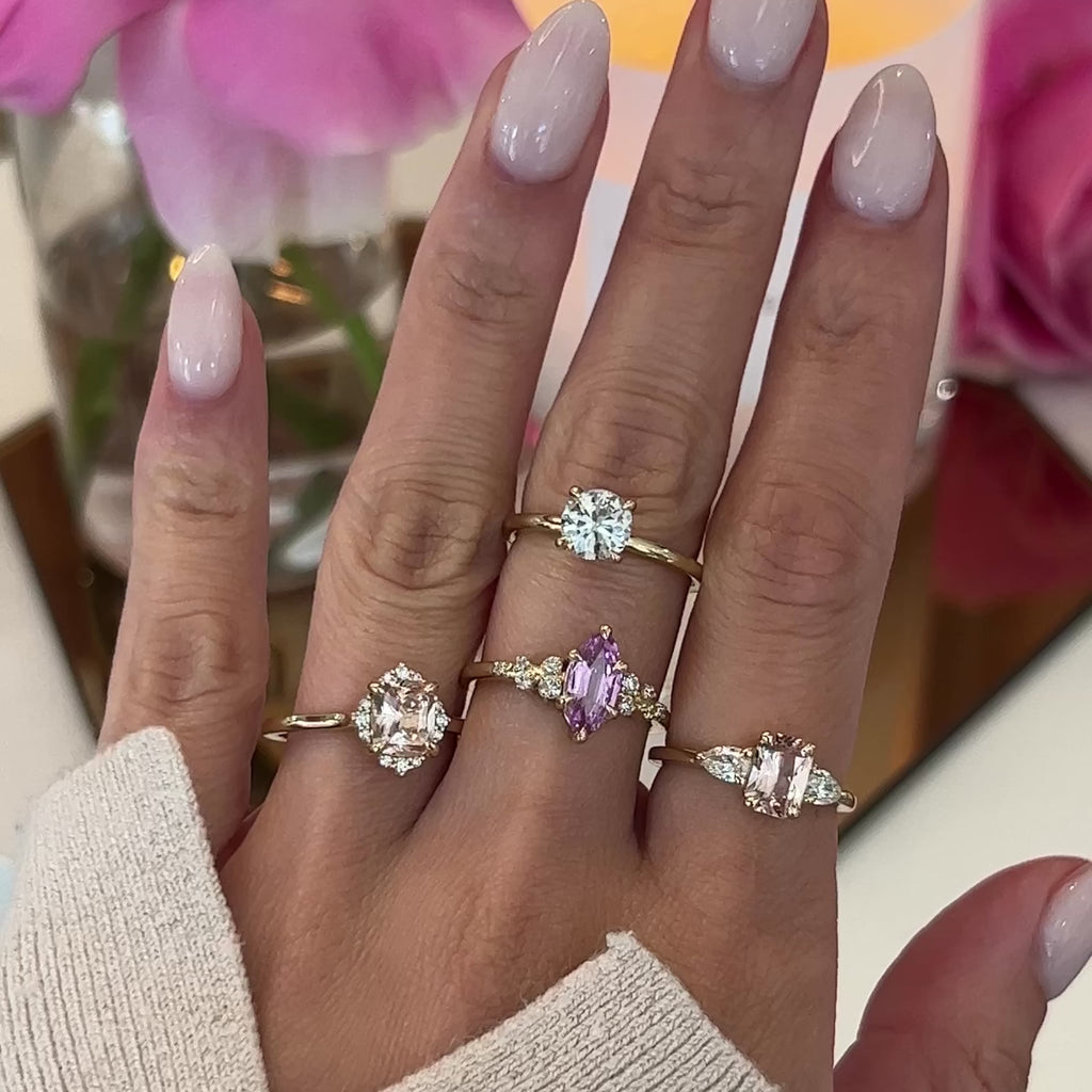 Video of 14k yellow gold peach sapphires, pink sapphires, and and diamond engagement rings