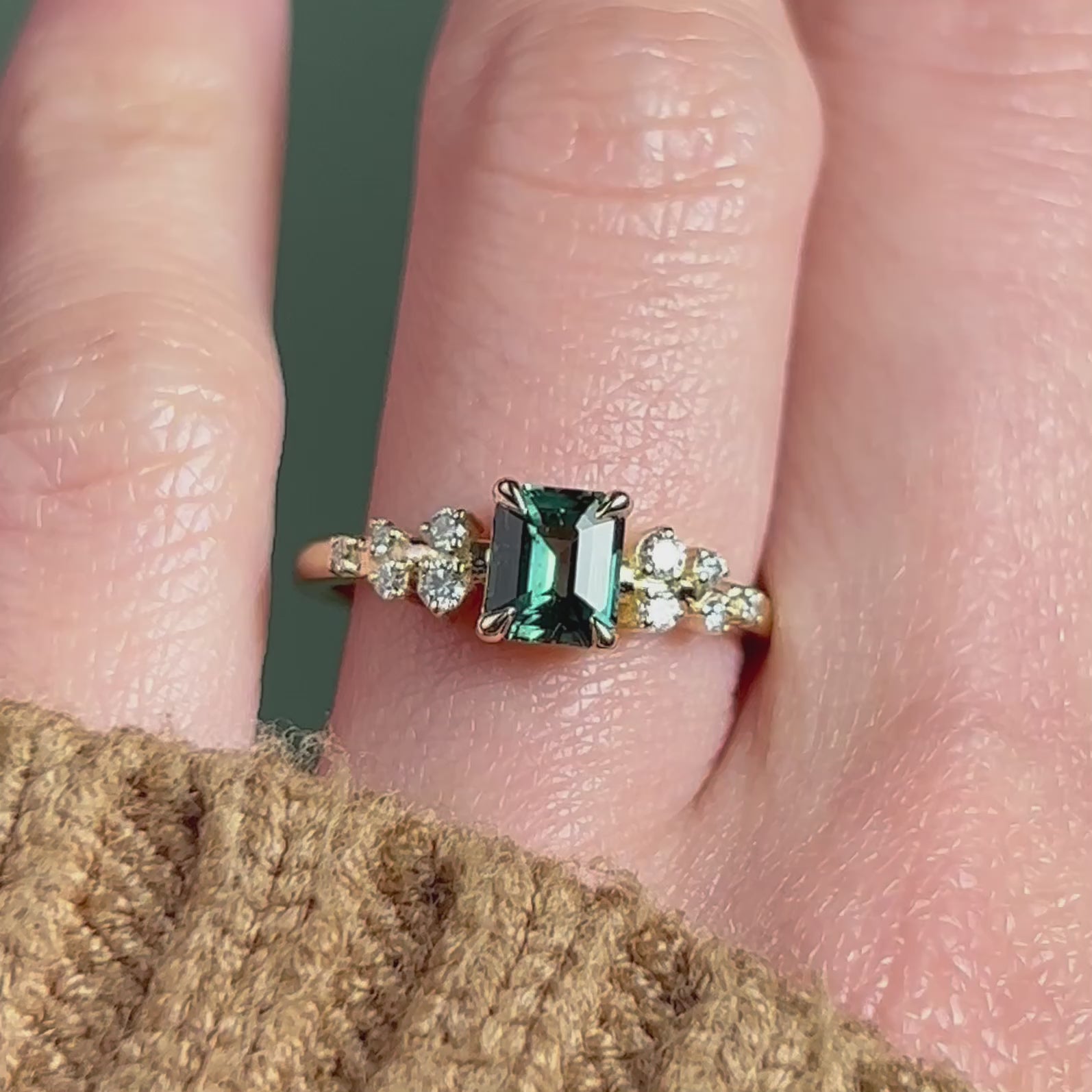 Teal emerald cut engagement ring