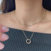 gold necklace stack with open circle pendant