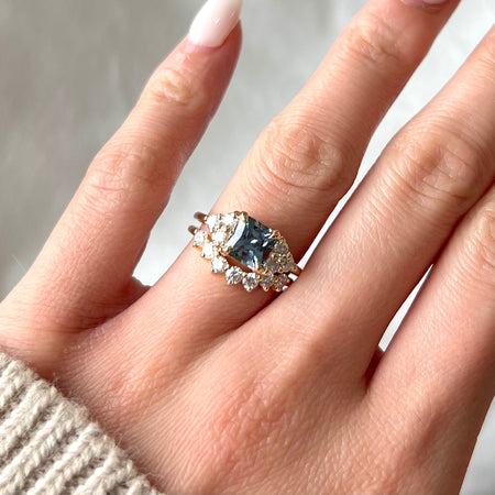asscher light blue sapphire engagement ring with diamonds