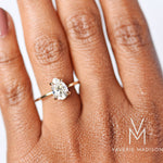 Vera Pear 1.5ct Moissanite Solitaire Engagement Ring modeled on hand