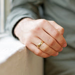 6mm Men's Classic Domed Wedding Band modeled on hand in natural light