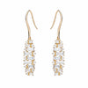 baguette earrings alternating as they dangle from north to south