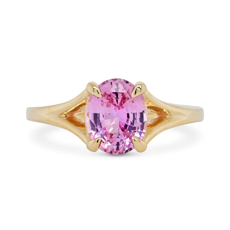 split shank ring with a lilac magenta oval stone set north south