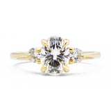 Zara Oval Three Stone Moissanite Engagement Ring in yellow gold